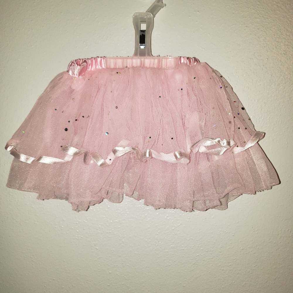 Pink frilly skirt. 12m.